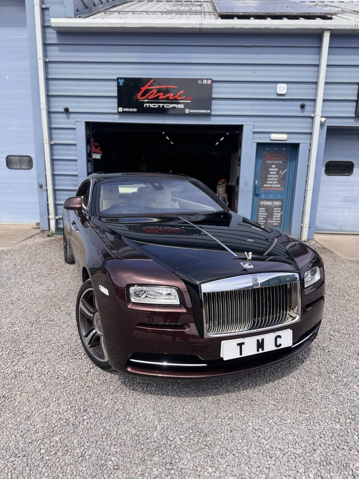 A Rolls-Royce Wraith outside the Team Mercedes Cardiff workshop
