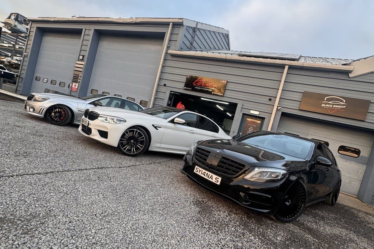 Cars parked outside the Team Mercedes Cardiff unit at Cardiff Marine Village